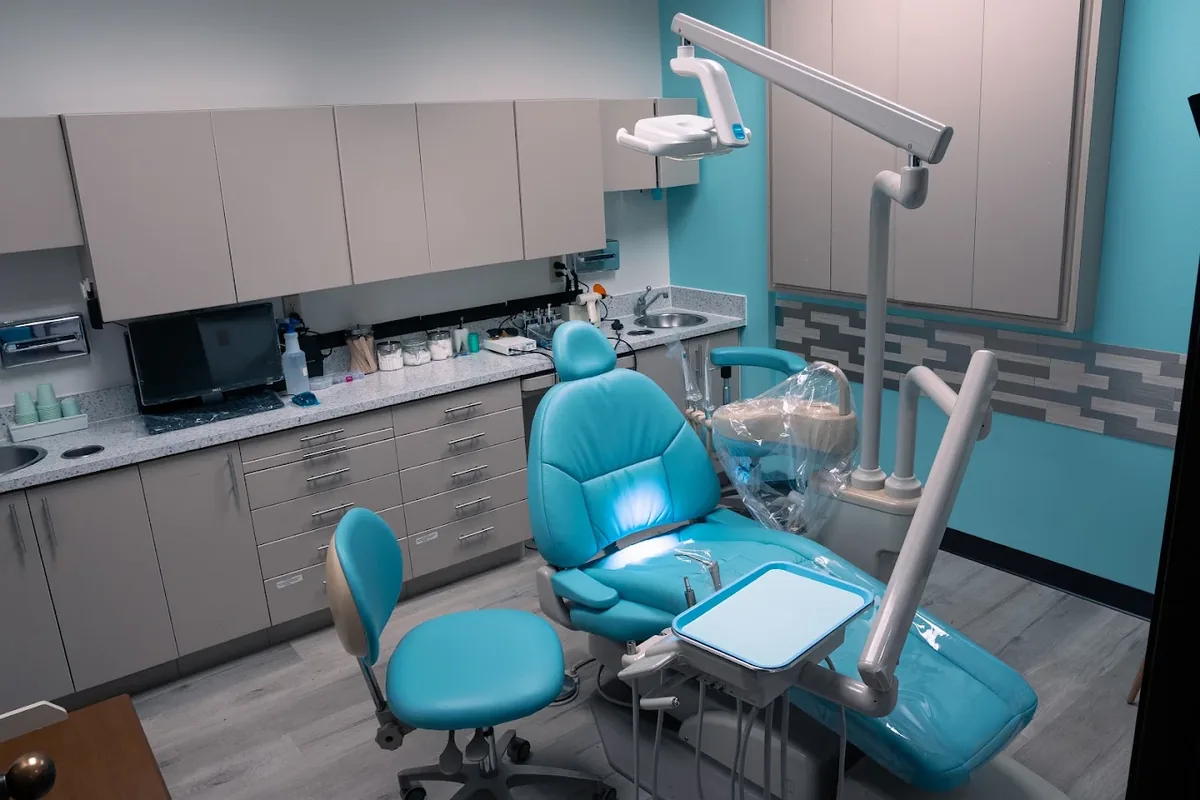 A dental operatory at Dentist 101 — the chair, light, and instruments students train with